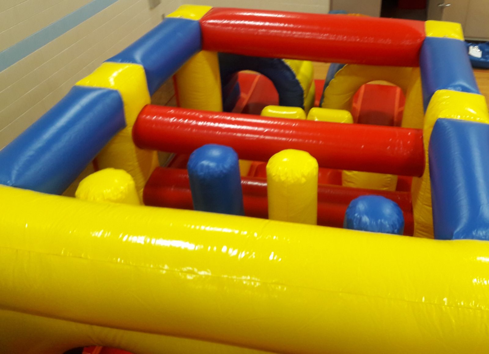 Top-view of obstacles inside inflatable obstacle course rental